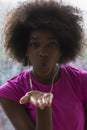 Portrait of young afro american woman in gym while listening mus Royalty Free Stock Photo