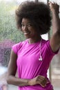 Portrait of young afro american woman in gym while listening mus Royalty Free Stock Photo