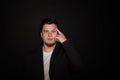 Portrait of young amazed man isolated on gray background Royalty Free Stock Photo