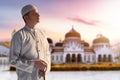 Portrait of young arab man at Baiturrahman Grand Mosque, Banda Aceh, Indonesia