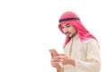 Portrait of young arabian holding the smartphone and looking to mobile screen on isolate white background