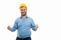 Young architect with yellow helmet showing winning gesture