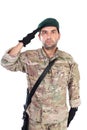 Portrait of young army soldier saluting Royalty Free Stock Photo