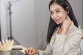 Portrait of young asain girl working at a call center