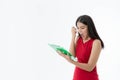 Portrait of young Asian beautiful business woman with red business dress feels angry , bored and very stressed with isolated white Royalty Free Stock Photo