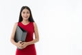 Portrait of young Asian beautiful business woman wears business red dress is holding file  white background Royalty Free Stock Photo