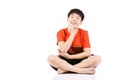 Portrait Young Asian boy sitting over white background Royalty Free Stock Photo