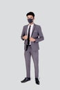 Portrait young asian businessman in suit confident wearing face mask for protective covid-19 isolated. Royalty Free Stock Photo