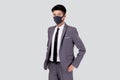 Portrait young asian businessman in suit wearing face mask for protective covid-19 isolated on white background. Royalty Free Stock Photo