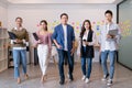 Portrait of young asian businesspeople standing indoors in office, looking at camera.Successful and confident business Startup Royalty Free Stock Photo