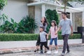 Young happy asian family walking together