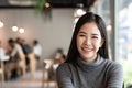 Young asian female in cafe