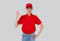 Portrait young asian man in uniform standing and smile with confident gesture ok isolated white background. Royalty Free Stock Photo