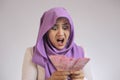 Indonesian Muslim Woman Shock with her Rupiah Money