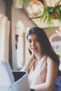 Portrait young Asian pretty business woman smiling and looking camera Royalty Free Stock Photo