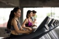 woman run on treadmills, control machine