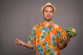 Portrait of young Asian tourist man holding pineapple Royalty Free Stock Photo