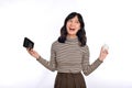 Portrait of young Asian woman casual uniform holding white piggy bank and calculator isolated on white background, Financial and Royalty Free Stock Photo