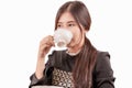 Portrait of young Asian woman drinking her morning coffee, tea, Royalty Free Stock Photo