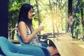 Portrait young asian woman drinking hot green tea latte in coffee shop. Royalty Free Stock Photo