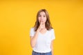 Portrait young asian woman finger on lips shhhhh quiet symbol gesture silence against in white t-shirt