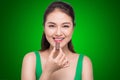 Portrait of a young asian woman holding a chocolate bar to enjoy Royalty Free Stock Photo