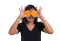 Portrait of young Asian woman. holding orange slices in front of her eyes and smile isolated on white background Royalty Free Stock Photo