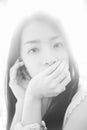 Portrait of young asian woman looked at camera,high key picture style,black and white color picture,soft focus. Royalty Free Stock Photo