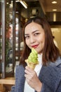 Portrait of young asian woman outdoors