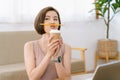 Portrait of young Asian woman rest relax during work keeping pencil between nose and lips as moustache looking funny and naughty Royalty Free Stock Photo