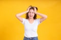 Portrait young asian woman stressed headache unhappy serious negative emotion in white t-shirt