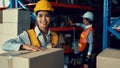 Portrait of young Asian woman warehouse worker smiling in the storehouse Royalty Free Stock Photo