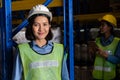 Portrait of young Asian woman warehouse worker smiling in the storehouse Royalty Free Stock Photo