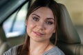 Portrait of young attractive caucasian woman in the car. Royalty Free Stock Photo