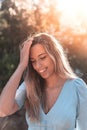 Portrait of a young and attractive caucasian woman near a forest Royalty Free Stock Photo