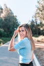 Portrait of a young and attractive caucasian woman near a forest Royalty Free Stock Photo