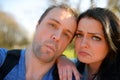 Portrait of young attractive couple having emotional fun tomfoolery together.