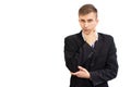 Portrait of young attractive doubting business man in a dark suit and a bright blue tie, isolated on white Royalty Free Stock Photo