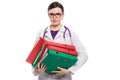 Angry young woman doctor with stethoscope holding binders in her hands in white uniform on white background Royalty Free Stock Photo