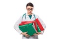 Confused young woman doctor with stethoscope holding binders in her hands in white uniform on white background Royalty Free Stock Photo