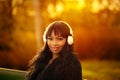 Portrait of young attractive girl with headphones outside Royalty Free Stock Photo