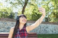 Portrait of young attractive girl listening to music with headph Royalty Free Stock Photo