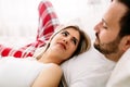 Portrait of young loving couple in bedroom Royalty Free Stock Photo