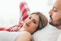 Portrait of young loving couple in bedroom Royalty Free Stock Photo