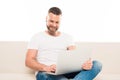 portrait of young attractive man using laptop, Royalty Free Stock Photo