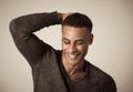 Fashion portrait of Attractive african american male model posing happy and sexy for the camera Royalty Free Stock Photo