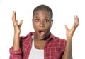 Portrait of young attractive surprised and shocked afro american woman in disbelief looking something amazing with mouth opened in Royalty Free Stock Photo
