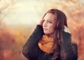 Portrait of an young attractive woman with long brown hair and b