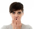 Portrait of Young attractive woman looking scared and shocked covering her face in fear Royalty Free Stock Photo