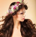 Portrait of Young Auburn Woman with Long Flowing Hairs and Wildflowers